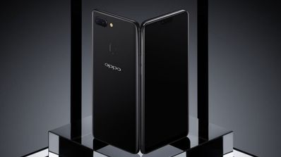 Teléfono Oppo R15 con fondo gris