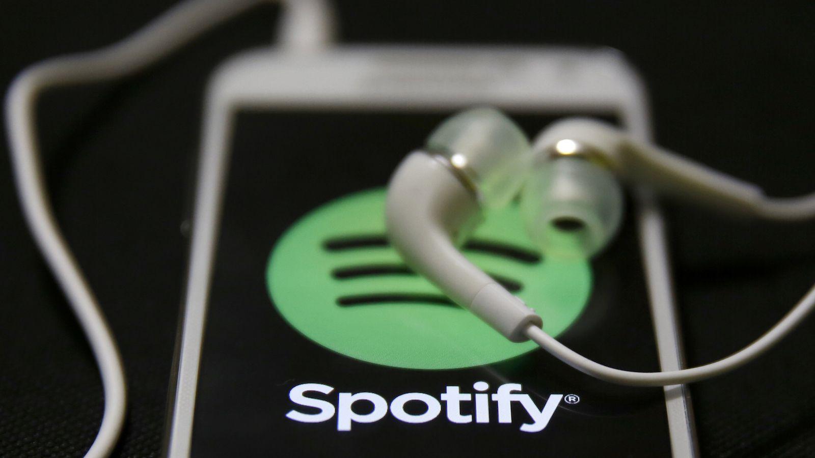 Logotipo Spotify con auriculares