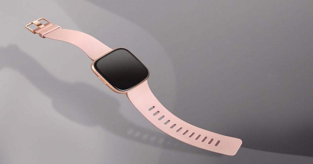Smartwatch Fitbit Versa con fondo gris