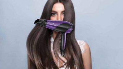 Secador de pelo Remington morado