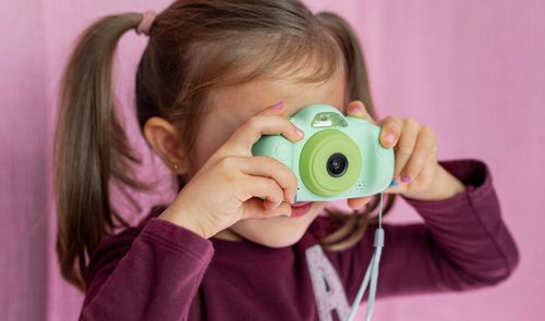 niña con cámara