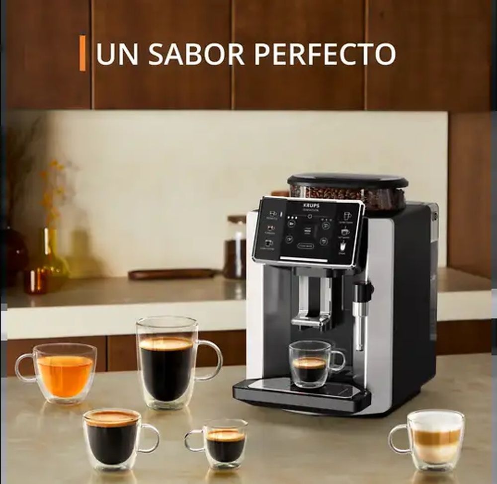 Cafetera superautomática Krups Sensation junto a varias tazas con diferentes tipos de café.