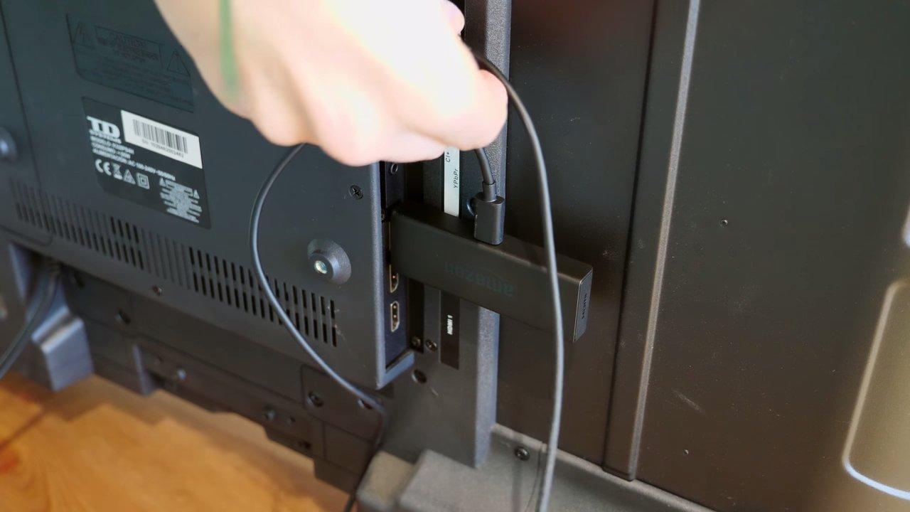 Reproductor Amazon Fire TV Stick conectado a un televisor